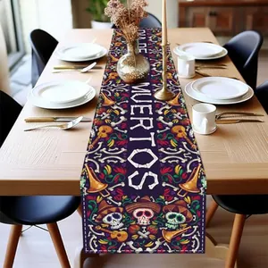 Day of the Dead sugar skull table runner displayed on a rustic wooden dining table