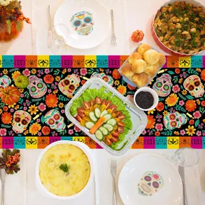 Day of the Dead sugar skull table runner decoration on dining table with festive food