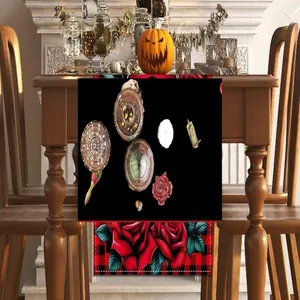 Sugar skull and red rose Day of the Dead table runner on a festive wooden table.