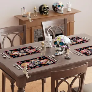 Sugar skull floral placemats set arranged on a decorated festive wooden dining table for Halloween