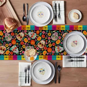Vibrant Day of the Dead table runner with sugar skull and marigold patterns for party