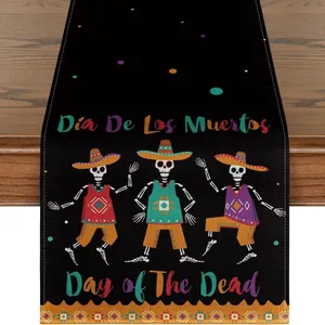 Detail shot of Day of the Dead table runner featuring colorful dancing skeleton illustrations