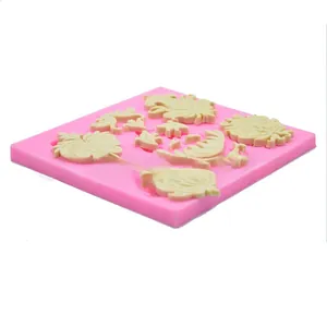 Detailweergave van een roze siliconen mal voor Halloween fondant vleugeldecoraties