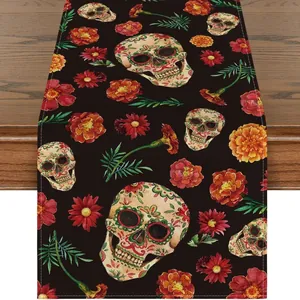 Detail of Mexican Day of the Dead table runner with vibrant skull and flower patterns
