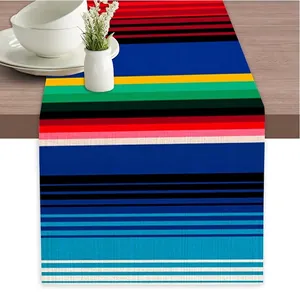 Detailed colorful Mexican serape striped linen table runner for festive home dining table decor