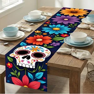 Detail of Mexican Day of the Dead table runner with sugar skull and floral pattern.