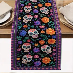 Detail view of Day of the Dead table runner with vibrant sugar skull and floral print