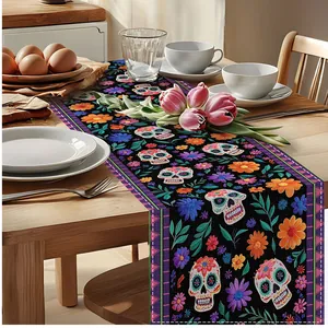 Table runner with Mexican Day of the Dead sugar skull and floral pattern on a dining table