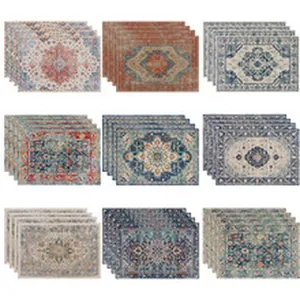Dettaglio di nove tovagliette americane con raffinati motivi etnici e fiori vintage
