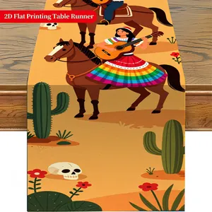 Detail showing vibrant Mexican Day of the Dead print with horse riders and cacti