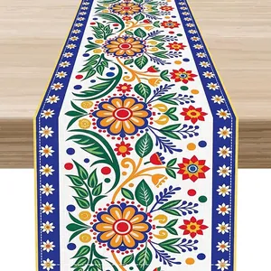 Macro detail of Mexican Bohemian linen table runner featuring colorful floral print design
