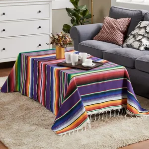 Traditional colorful Mexican stripe serape blanket used as a festive tablecloth