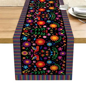 Detailed view of Mexican Bohemian table runner with vibrant floral and bird patterns.