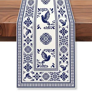 Detail view of Bohemian Mexican style linen table runner with blue bird print