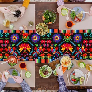 Vibrant Mexican Day of the Dead table runner with colorful floral and folk bird patterns.