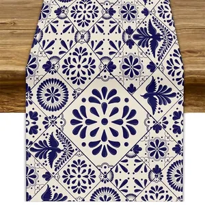 Detailed macro view of Mexican Bohemian blue and white floral linen print on table runner