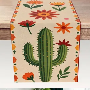 Nahaufnahme eines mexikanischen Tischläufers mit Kaktus- und bunten Blumenmustern