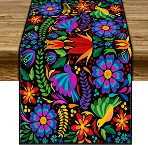 Vibrant Mexican ethnic linen table runner with colorful floral bird pattern on black