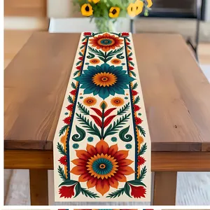 Detailansicht eines mexikanischen Tischläufers mit buntem Sonnenblumen-Folklore-Muster.