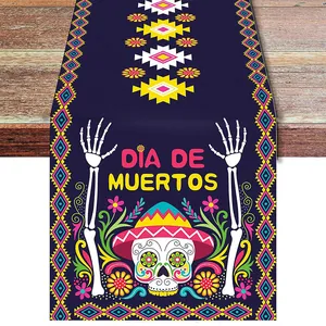Detailed view of the vibrant Dia de Muertos table runner with sugar skull print patterns.