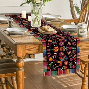 Chemin de table mexicain Jour des Morts avec fleurs colorées sur table en bois