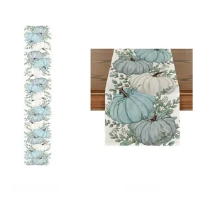 Autumn harvest table runner with blue pumpkins and sage leaves pattern detail