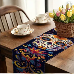 Mexican sugar skull table runner with vibrant floral patterns on a wooden dining table