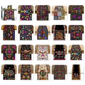 Diverse collection of Mexican festive table runners with floral, bird and skull patterns