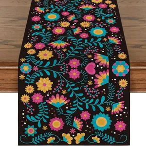 Mexican Day of the Dead floral table runner with vibrant folk art print on black