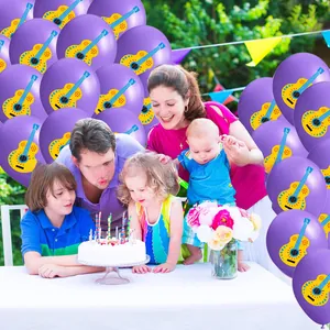 Family celebrating with purple Cinco de Mayo balloons featuring guitar prints