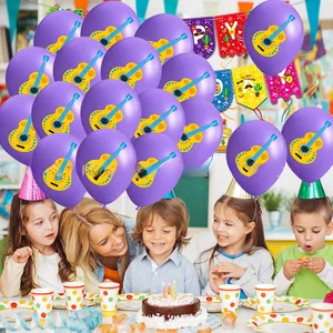 Detailed view of festive purple balloons featuring yellow guitar prints for a kids birthday party