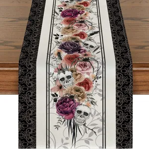 Gothic Day of the Dead table runner featuring skull and rose prints for Halloween decor