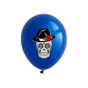 Detailed view of blue latex balloon with festive sugar skull print for Day of the Dead