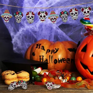 Wooden Halloween sugar skull ornaments and Mexican hat decorations in a festive scene.