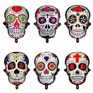 Set of six colorful Day of the Dead sugar skull shaped foil balloons for party decoration