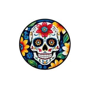 Detailed view of a vibrant Mexican sugar skull pattern on a round outdoor sign