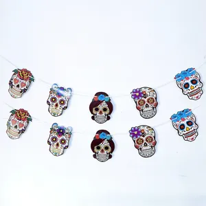 Detailed view of Mexican Day of the Dead sugar skull banner with colorful floral designs