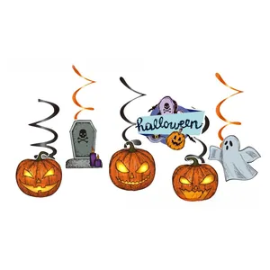 Detail of Halloween spiral decorations featuring Jack-o'-lantern and ghost cutouts