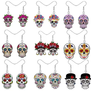 Detailed view of various acrylic sugar skull earrings with vibrant floral patterns