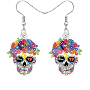 Colorful acrylic sugar skull earrings featuring vibrant floral crown on white background