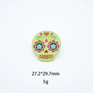 Detailed view of green Mexican sugar skull enamel pin with 27.2*29.7mm dimensions