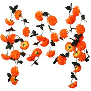 Vibrant orange artificial marigold garland for Day of the Dead and Halloween decor.