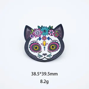 Macro detail view of colorful Mexican sugar skull cat enamel pin showing size 38.5x39.5mm