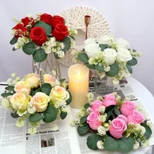 Handcrafted artificial rose bouquets in multiple colors with greenery for home decor.