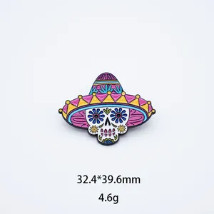 Detailed view of colorful Mexican sugar skull enamel brooch with size and weight