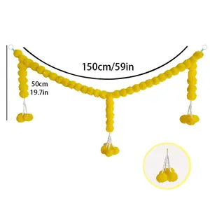 Close-up detail of yellow marigold garland with 150cm length and 50cm drop size