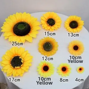 Artificial sunflower heads in multiple sizes from 4cm to 25cm for festive decor.