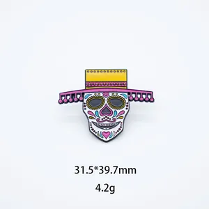 Close-up detail of Mexican sugar skull enamel pin with hat showing dimensions 31.5x39.7mm