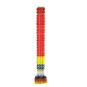 Vibrant multi-colored plastic marigold garlands for Day of the Dead and wedding decor.
