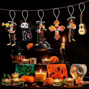 Traditional view of wooden Mexican Day of the Dead pendants in a festive altar setting
